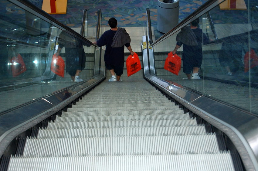 shopper down escalator